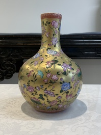 A Chinese gilt-ground famille rose vase with floral design, Qianlong mark and possibly of the period