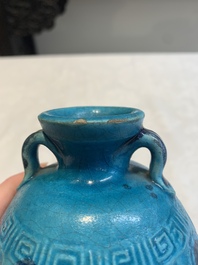A Chinese turquoise-glazed brush rest and a Fahau vase, 18/19th C.