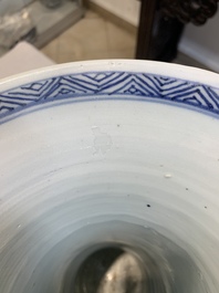 A Chinese blue and white 'gu' vase with floral design, Kangxi