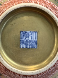 A Chinese gilt-ground famille rose vase with floral design, Qianlong mark and possibly of the period