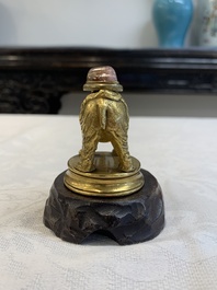 A Chinese pink quartz-inset gilt bronze elephant, 18th C.