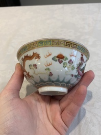 Four Chinese famille rose bowls and a blue and white bowl, Guangxu mark, 19/20th C.