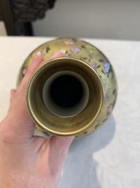 A Chinese gilt-ground famille rose vase with floral design, Qianlong mark and possibly of the period