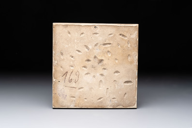 A cobalt blue ground epigraphic Islamic pottery tile, perhaps Kutahya, Turkey, 19th C.