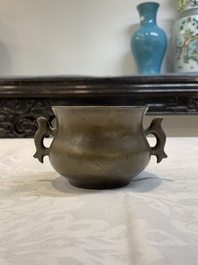 A Chinese bronze censer with Xuande mark and an archaistic vessel, 18/19th C.