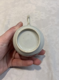 A Chinese famille rose 'Venus and Mercury' cup and saucer, Qianlong