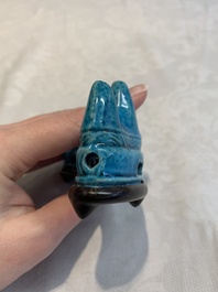 A Chinese turquoise-glazed brush rest and a Fahau vase, 18/19th C.