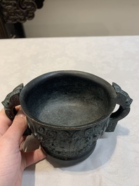 A Chinese bronze censer with Xuande mark and an archaistic vessel, 18/19th C.