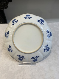 Six Chinese blue and white 'lotus' plates, Kangxi