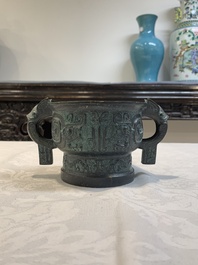 A Chinese bronze censer with Xuande mark and an archaistic vessel, 18/19th C.
