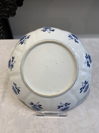 Six Chinese blue and white 'lotus' plates, Kangxi