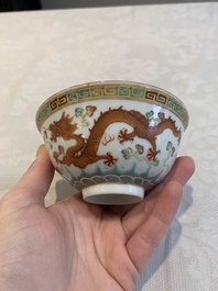 Four Chinese famille rose bowls and a blue and white bowl, Guangxu mark, 19/20th C.