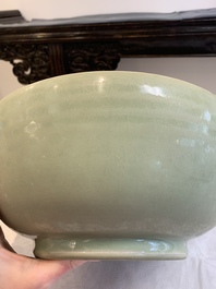 A Chinese Longquan celadon bowl with 'anhua' floral design, Ming