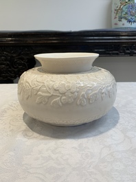 A rare Chinese Dehua blanc de Chine vase with floral design, Kangxi