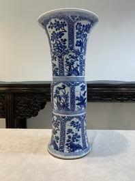 A Chinese blue and white 'gu' vase with floral design, Kangxi