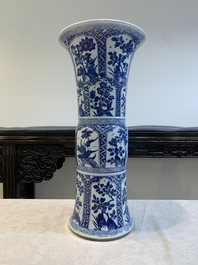 A Chinese blue and white 'gu' vase with floral design, Kangxi