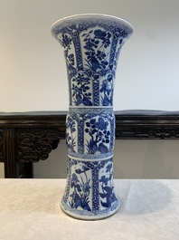 A Chinese blue and white 'gu' vase with floral design, Kangxi