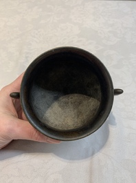 A Chinese bronze censer with Xuande mark and an archaistic vessel, 18/19th C.