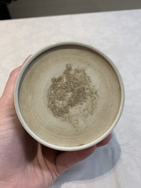 A Chinese famille rose 'shou' plate and a '100 boys' brush pot, Guangxu mark, 20th C.