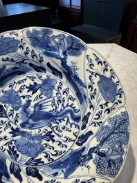 A Chinese blue and white lobed 'flower' plate and a 'phoenix and monkeys' plate, Kangxi