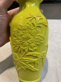 A pair of Chinese yellow Peking glass vases with peonies and a bird, 20th C.