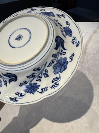 A Chinese blue and white lobed 'flower' plate and a 'phoenix and monkeys' plate, Kangxi