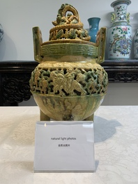 A Chinese sancai-glazed reticulated double-walled tripod censer and cover, Ming