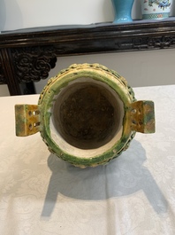 A Chinese sancai-glazed reticulated double-walled tripod censer and cover, Ming