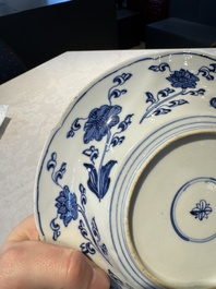 A Chinese blue and white lobed 'flower' plate and a 'phoenix and monkeys' plate, Kangxi