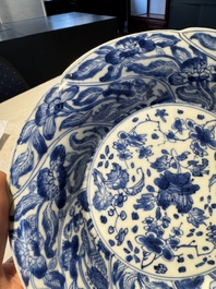 A Chinese blue and white lobed 'flower' plate and a 'phoenix and monkeys' plate, Kangxi
