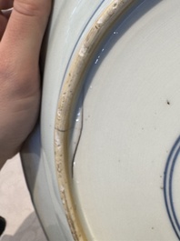 A pair of Chinese blue and white 'floral' dishes, Chenghua mark, Kangxi