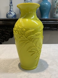 A pair of Chinese yellow Peking glass vases with peonies and a bird, 20th C.