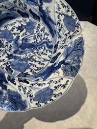 A Chinese blue and white lobed 'flower' plate and a 'phoenix and monkeys' plate, Kangxi