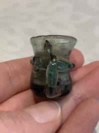 A Dutch or German green glass reliquary holder, excavated in Maastricht, 16/17th C.