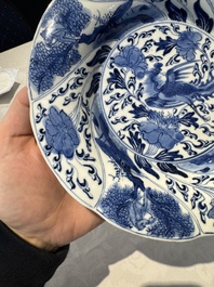 A Chinese blue and white lobed 'flower' plate and a 'phoenix and monkeys' plate, Kangxi