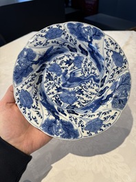 A Chinese blue and white lobed 'flower' plate and a 'phoenix and monkeys' plate, Kangxi