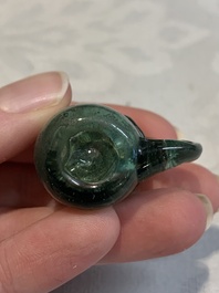 A Dutch or German green glass reliquary holder, excavated in Maastricht, 16/17th C.