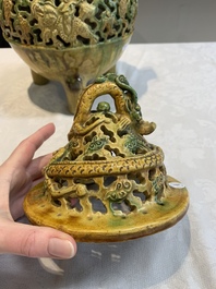 A Chinese sancai-glazed reticulated double-walled tripod censer and cover, Ming