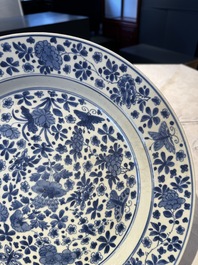 A pair of Chinese blue and white 'floral' dishes, Chenghua mark, Kangxi