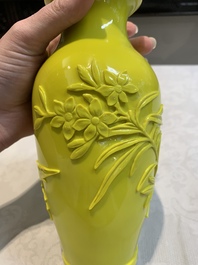 A pair of Chinese yellow Peking glass vases with peonies and a bird, 20th C.