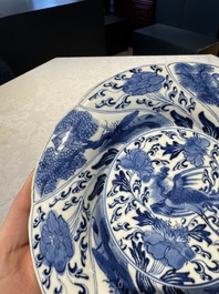 A Chinese blue and white lobed 'flower' plate and a 'phoenix and monkeys' plate, Kangxi