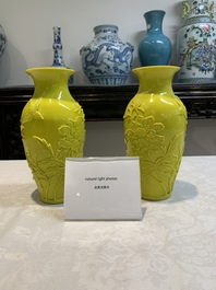 A pair of Chinese yellow Peking glass vases with peonies and a bird, 20th C.