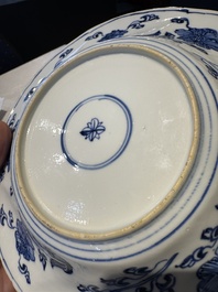 A Chinese blue and white lobed 'flower' plate and a 'phoenix and monkeys' plate, Kangxi