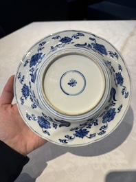 A Chinese blue and white lobed 'flower' plate and a 'phoenix and monkeys' plate, Kangxi