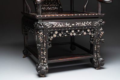 A Chinese mother-of-pearl-inlaid hongmu reclining armchair with a retractable footrest, Canton, 19th C.