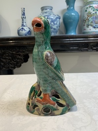 A pair of Chinese sancai-glazed parrots, 19th C.