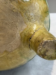 A Chinese sancai-glazed reticulated double-walled tripod censer and cover, Ming