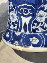 A pair of Chinese blue and white 'gu' vases with floral design, Kangxi