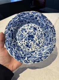 A Chinese blue and white lobed 'flower' plate and a 'phoenix and monkeys' plate, Kangxi
