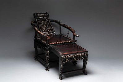 A Chinese mother-of-pearl-inlaid hongmu reclining armchair with a retractable footrest, Canton, 19th C.